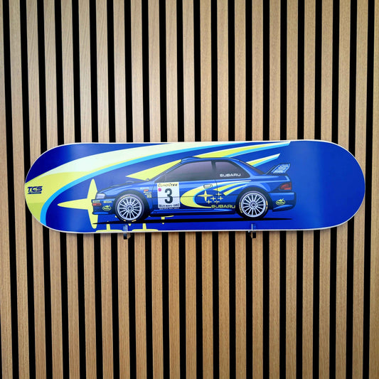 Skateboard deck with car design on a striped background