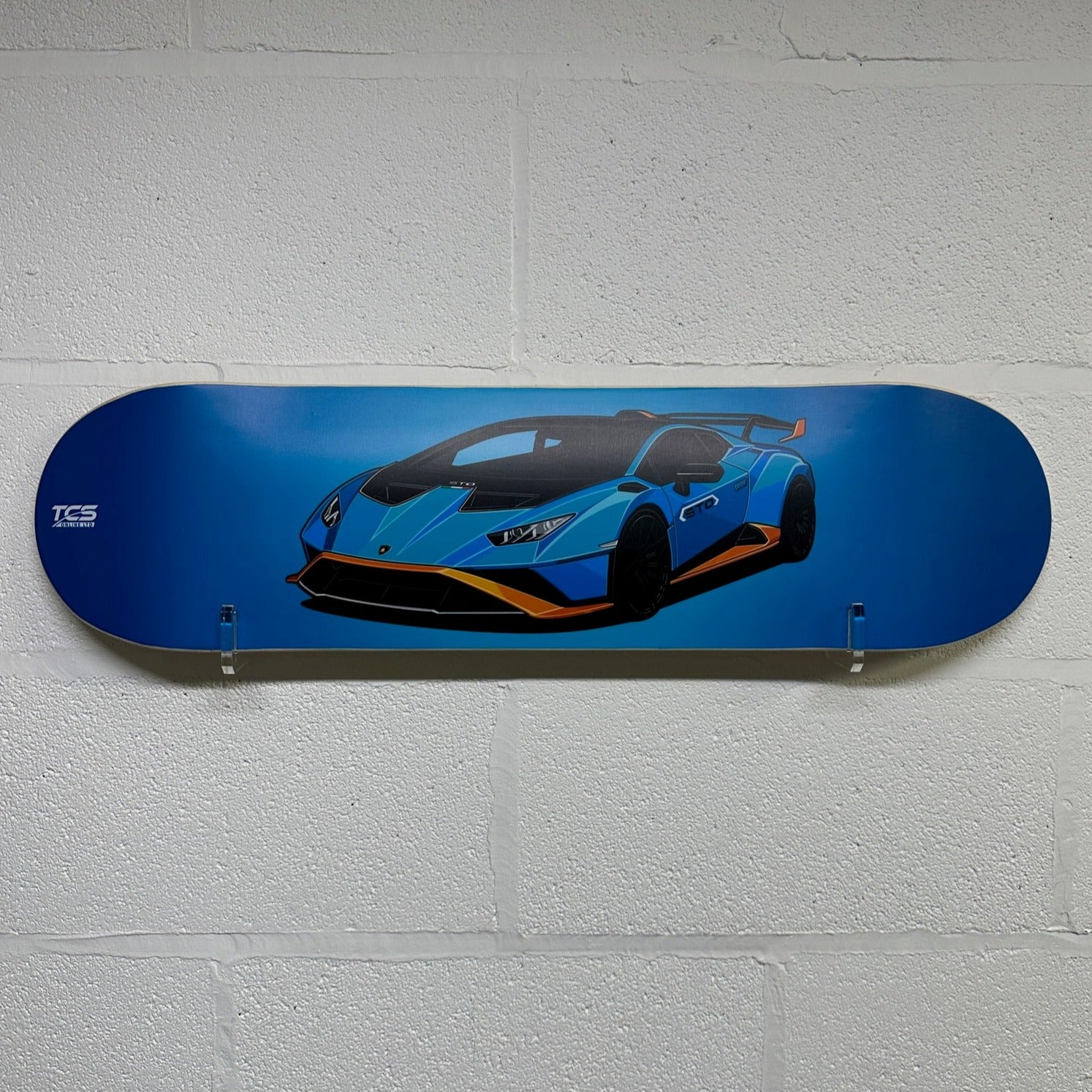 Blue and orange Lamborghini Huracán STO skateboard