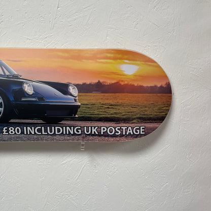 Promotional graphic with a car on a road at sunset, priced at £80 including UK postage.