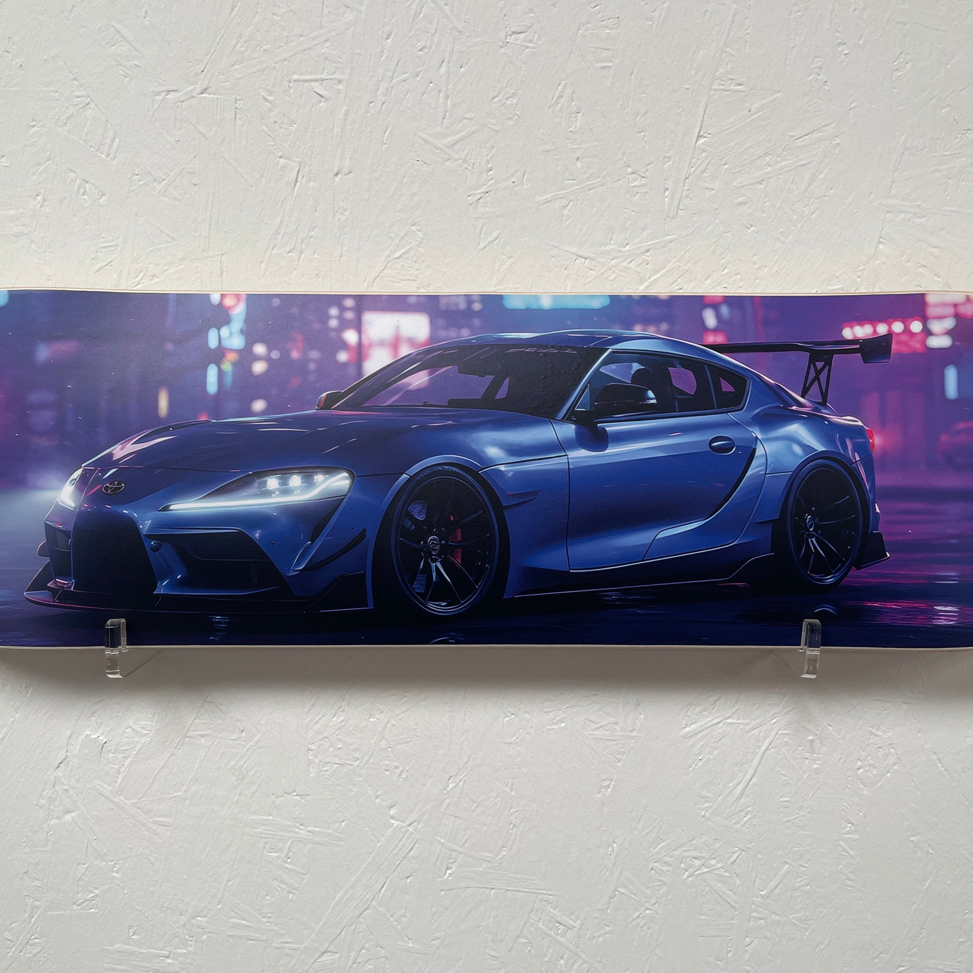 Blue sports car on a white background