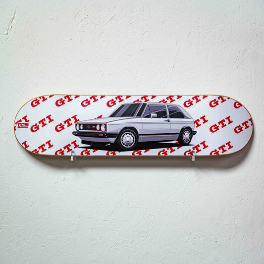 Skateboard deck with a car illustration and 'GTI' branding on a white background
