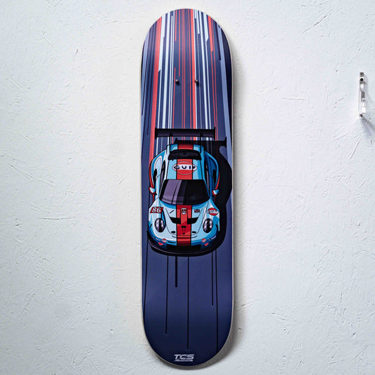 Skateboard deck with a car design on a white background