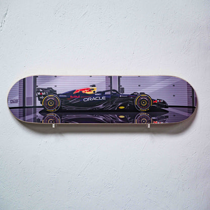 Skateboard deck with Formula 1 car design on a white background