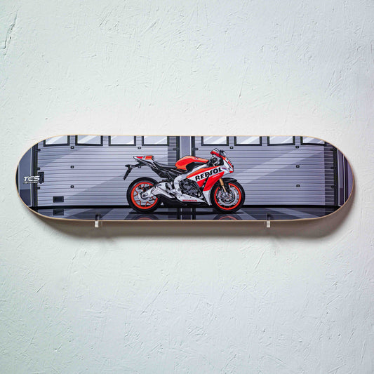 Skateboard deck with a motorcycle design on a light gray background